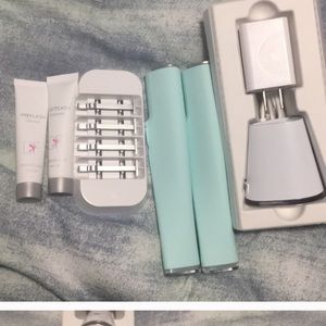 Two brand new wands a charger and blades